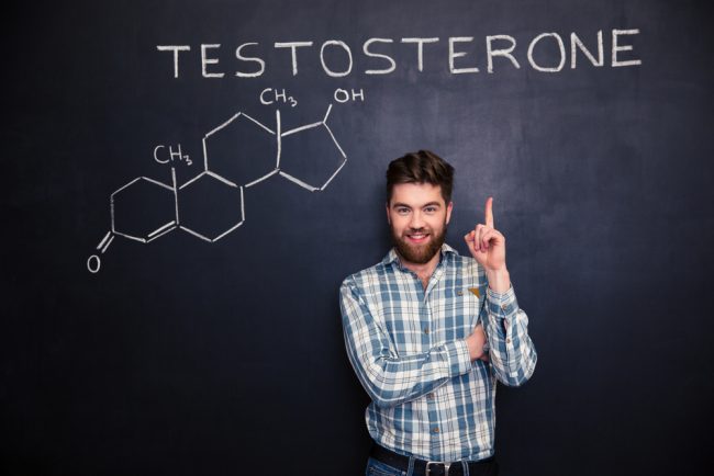 man pointing at testosterone structure