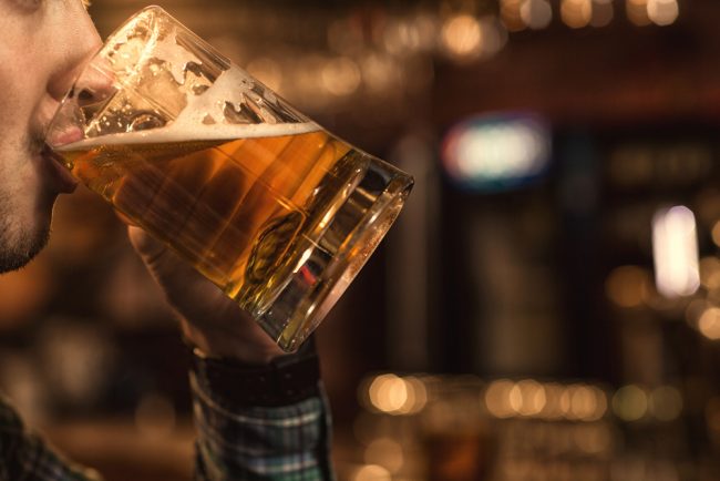 man having a drink