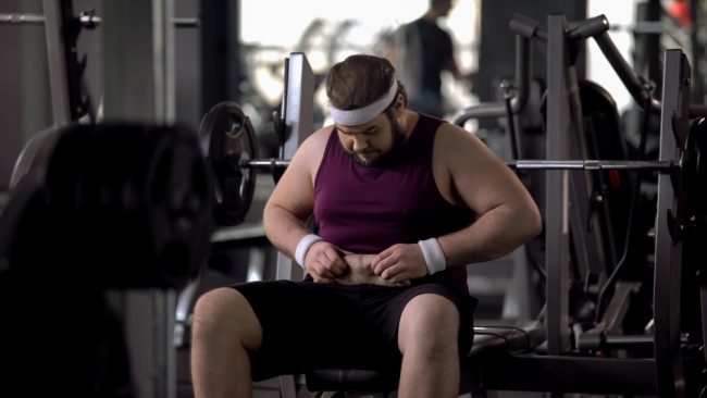 chubby man in gym