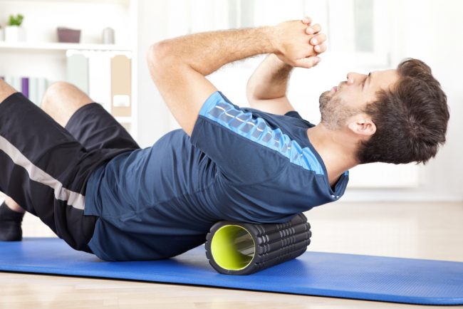 back exercise using a foam roller