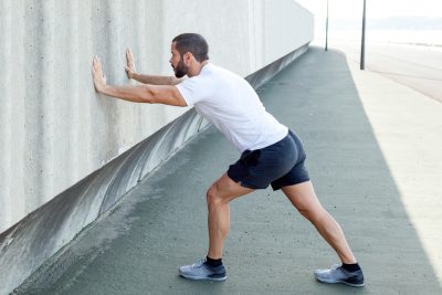 standing wall calf stretch